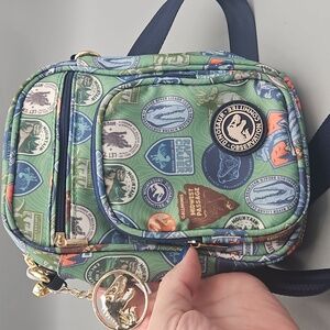 Jurassic World Universal Studios Parks Into The Wild Patches Crossbody Bag